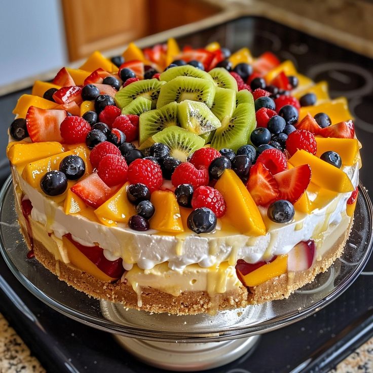 there is a cake with fruit on it