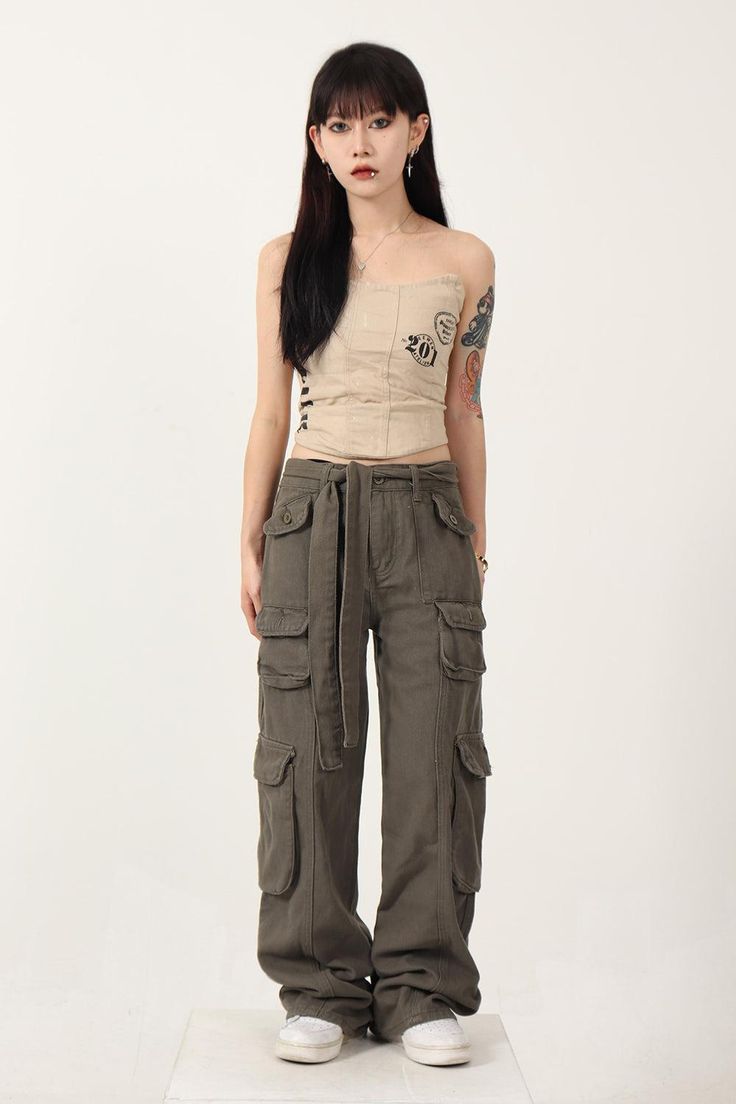 Discover trendy and functional Cargo Pants in Yuppie Style, perfect for combining style and utility. These cargo pants are designed for comfort and versatility, making them a must-have in your wardrobe. Size Chart (cm): Size S M L XL Length 94 98 102 104 Waist 60 66 72 80 Hip 94 100 106 112 Military Style Wide Leg Cargo Bottoms, Military Wide Leg Cargo Bottoms, Military Cargo Style Wide Leg Bottoms, Spring Military Style Cotton Cargo Jeans, Spring Utility Cargo Pants Full Length, Spring Military Wide Leg Cargo Pants, Spring Military Style Wide Leg Cargo Pants, Spring Military Wide-leg Cargo Pants, Khaki Full-length Utility Parachute Pants