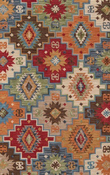 an area rug with many different colors and designs