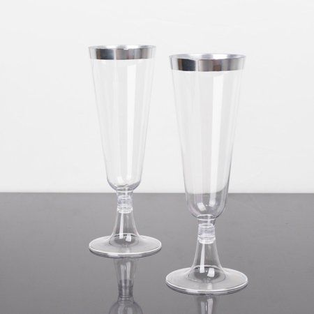 two clear glass vases sitting on top of a table