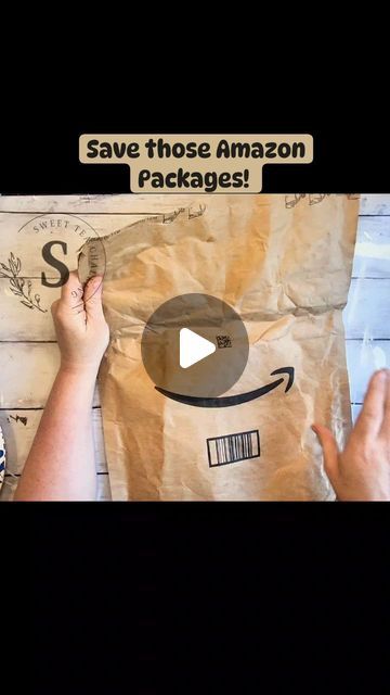 someone is holding a brown bag with an amazon logo on it and the text save those amazon packages