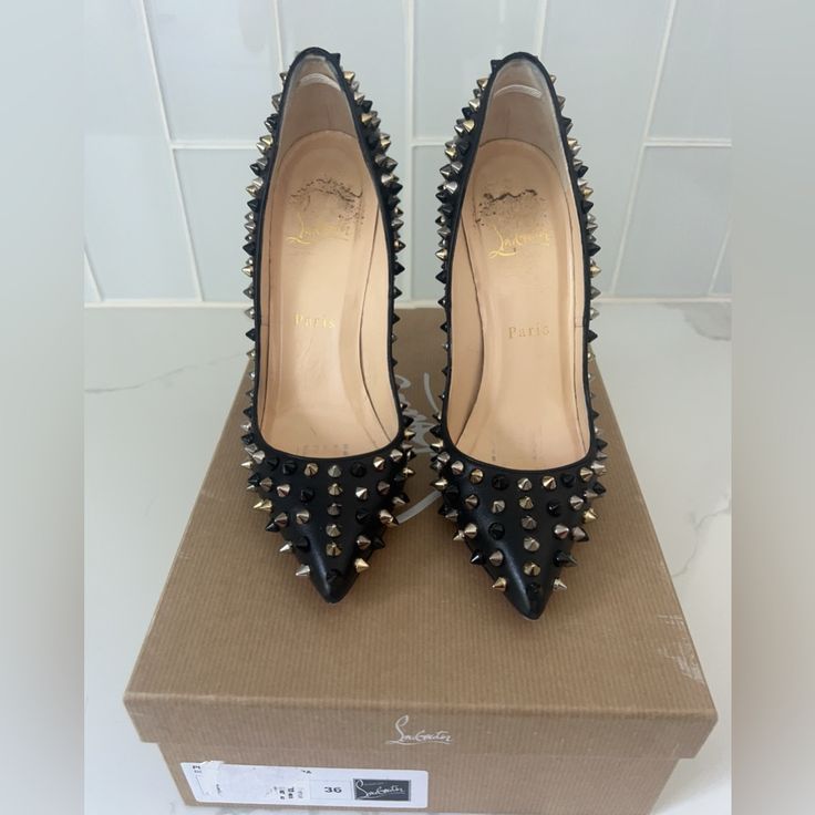 Worn A Few Times Black Silver Gold Spikes 120 Mm Heels Box Included Spare Heel And Spikes Luxury Silver-studded Pointed Toe Heels, Luxury Studded Heels For Party, Luxury Studded Party Heels, Luxury Formal Heels With Gold Studs, Luxury Gold-studded Heels For Formal Occasions, Luxury Gold Studded Heels For Formal Occasions, Luxury Gold Studs Heels For Formal Occasions, Luxury Silver-studded Heels For Evening, Luxury Silver-studded Evening Heels