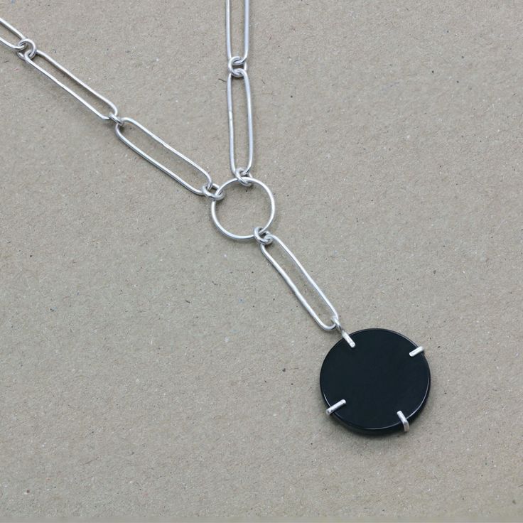 Beyond Time Time passes relentlessly, you cannot tame it, you can only keep it in memories enchanted into objects. A timeless collection inspired by the work and passion of our friend - a watchmaker One of a kind, unique, extremely effective, entirely hand made. Sterling Silver Necklace With Black Enamel, Modern Sterling Silver Jewelry With Black Enamel, Modern Sterling Silver Long Chain Necklace, Black Minimalist Necklace With Silver Chain, Minimalist Black Chain Necklace With Silver Details, Modern Long Sterling Silver Chain Necklace, Minimalist Black Chain Necklace With Silver Chain, Minimalist Black Necklace With Silver Chain, Modern Silver Necklace With Black Enamel