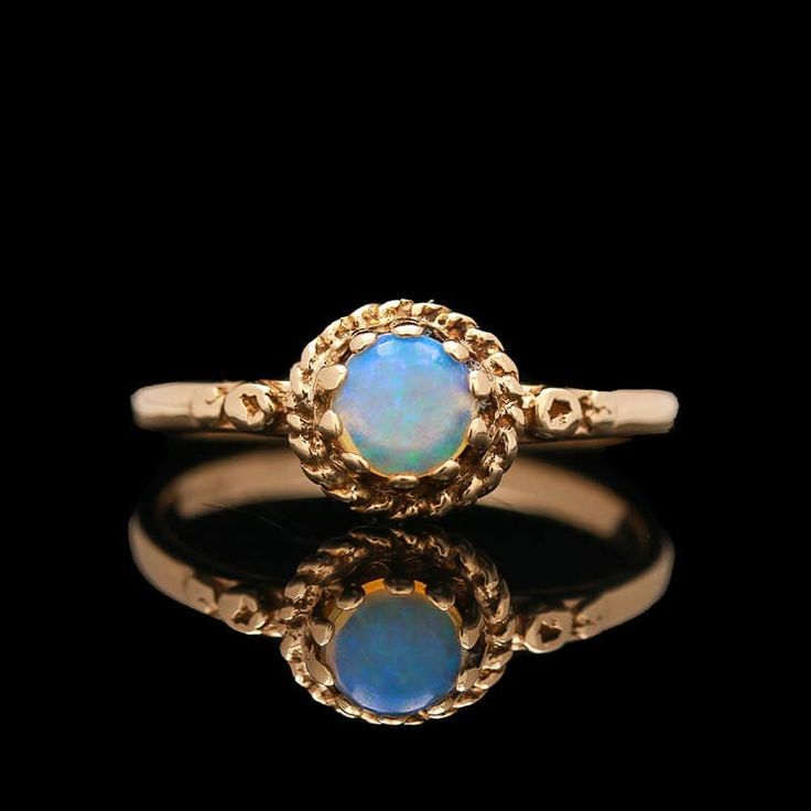 An antique 14k yellow gold and round opal cabochon ring. SR2362 Weight:1.90 grams (Inclusive of all materials) Ring Size: 6.25 Opal (1) Round Cabochon Stone Measurement: 4.55 mm Cabochon Ring, Rings Statement, Cincinnati, Statement Rings, Jewelry Rings, Opal, Ring Size, Yellow Gold, Size 6