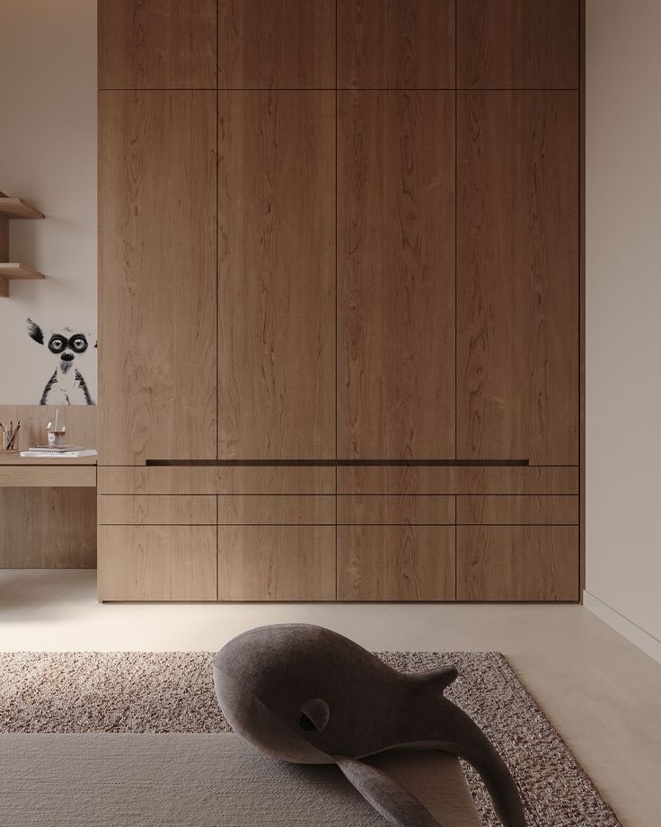 a large wooden cabinet in the middle of a room with a rug on the floor