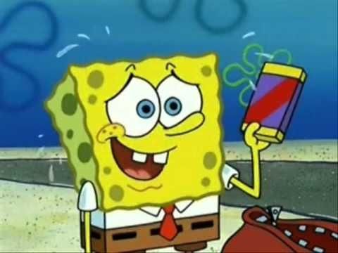 spongebob holding up a cell phone in his hand