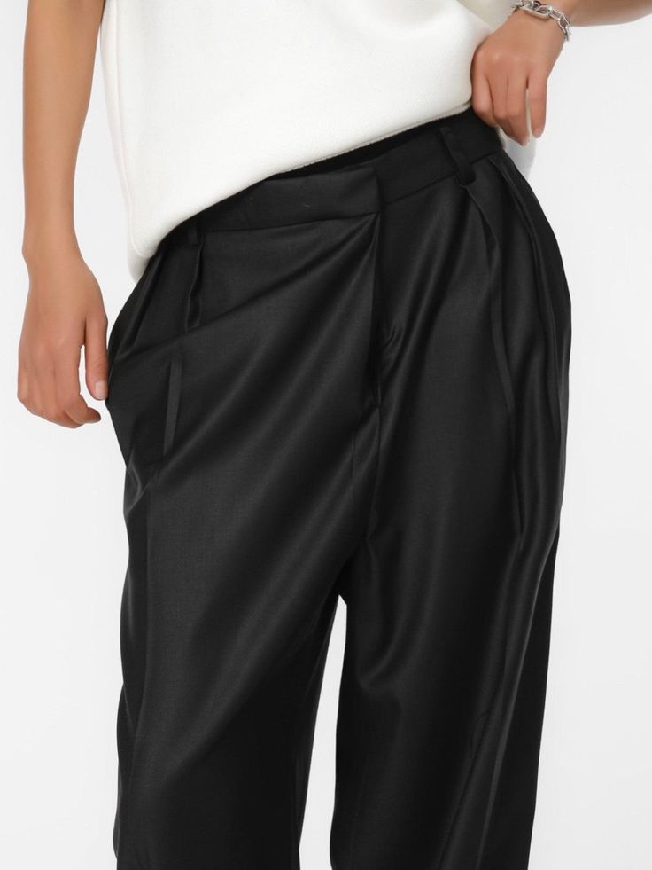 High rise trouser with wide leg and an unbalanced fly at waistband. Creates a stunning silhouette and interesting design. Model is in MINUSEY S. ✔️ Free worldwide express shipping over $100✔️ Loved by 6,500+ customers✔️ Limited edition collections, maximum style⠀⠀⠀⠀⠀⠀⠀⠀⠀Stay ahead of the trend with can’t-find-anywhere-else staples. Your closet will thank you 💕 * MINUSEY S = EU 34, US 2* MINUSEY M = EU 36, US 4* 10% Wool / 60% Polyester / 28% Rayon / 2% Spandex* Dry clean* Made in Korea - Model Height: 172cm/5'7" (US2, EU34) Formal Baggy Wide-leg Bottoms, Wide Leg Evening Bottoms With Belt Loops, Evening Ankle-length Pants With Belt Loops, Ankle-length Evening Pants With Belt Loops, Baggy High-waisted Wide Leg Pants For Formal Occasions, Baggy Long Pants For Formal Occasions, Baggy Long Formal Pants, Formal Baggy High-waisted Wide Leg Pants, Formal Baggy Wide Leg Pants