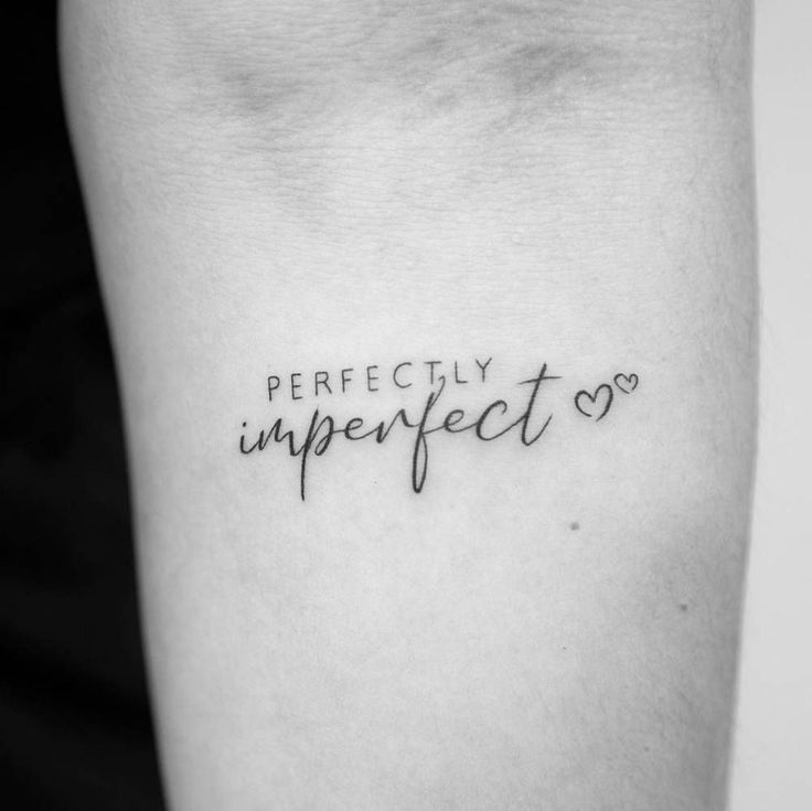 a black and white photo with the words perfectly imperfect