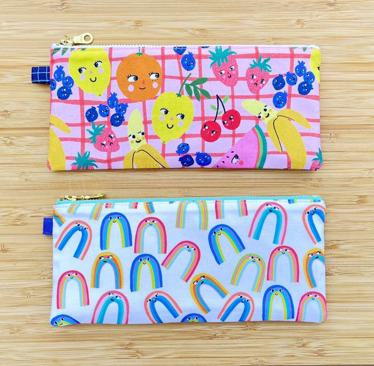 "This slim, minimalist pencil pouch is perfectly sized to hold all your favorite school and office supplies - pencils, pens, markers, scissors, you name it. It works just as well as a cosmetics bag or clutch!  Constructed using 100% cotton fabric, with interfacing for structure and durability. High quality, sturdy YKK gold metal zipper closure. Approximate dimensions: 8.5\" L x 3.75\" H (8\" opening) Materials:  - 100% cotton exterior fabric - 100% cotton lining fabric - Interfacing (for structu Playful Pencil Case For Everyday Use, Back To School, Playful Pencil Case For Back To School, Trendy Zipper Pouch Stationery, Back To School Rectangular Zipper Pouch Stationery, Playful Rectangular Pencil Case For Back To School, Trendy Rectangular Stationery For Everyday Use, Trendy Rectangular Pencil Case With Pen Slots, Back To School Pencil-shaped Zipper Pouch, Playful Pencil-shaped Pencil Case With Pen Holders