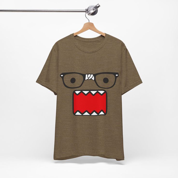 Unisex Domo Kun Tshirt - Emo Scene y2k Fashion Tshirt - 2000's Vintage Cartoon Hot Topic This classic unisex jersey short sleeve tee fits like a well-loved favorite. Soft cotton and quality print make users fall in love with it over and over again. These t-shirts have-ribbed knit collars to bolster shaping. The shoulders are tapered for a better fit over time. Dual side seams hold the garment's shape for longer.  .: Made with 100% Airlume combed and ring-spun cotton, a lightweight fabric (4.2 oz Y2k T-shirt With Logo Print And Relaxed Fit, Y2k Crew Neck T-shirt With Logo Print, Y2k Graphic T-shirt With Relaxed Fit, Y2k Relaxed Fit T-shirt With Funny Print, 90s Graphic Print Crew Neck T-shirt, 90s Style Graphic Print Crew Neck T-shirt, Retro Short Sleeve Shirt For Streetwear, Retro Short Sleeve T-shirt For Streetwear, Cotton Short Sleeve Fan Apparel T-shirt