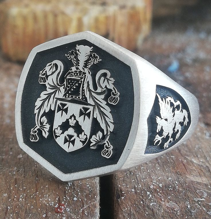 "Your custom solid sterling Silver ring will be made on your order, customize this Coat of Arms and your logo on this collection! A beautiful symbol that will fit your hands and style. perfect gift for anniversary, special dates and any date you can imagine can be Personalized. Different colors are silver, gold, rose gold. White gold and 24K gold options will never tarnish and last decades. Please contact me if you are interested in my jewelry. >ABOUT ME: I have 35 years of experience in making custom handmade silver and gold jewelry, including custom engraved Signet rings My childhood kind of allowed me to live among precious metals and gems pretty much I opened my workshop back in 1986 Never got bored of making Personalized gifts, birth flower rings, engagement rings with real diamonds F Pinky Signet Ring Family Crest, Luxury Heirloom Signet Ring With Coat Of Arms, Luxury Signet Ring With Coat Of Arms, Custom Hallmarked Signet Ring For Anniversary, Black Sterling Silver Signet Ring With Engraving Option, Custom Hallmarked Signet Ring For Wedding, Custom Wedding Signet Ring Hallmarked, Heirloom Silver Rings For Commemoration, Custom Jewelry With Engraving Option