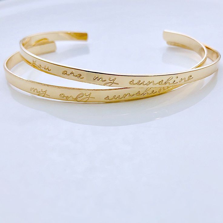 "You are my Sunshine Bracelet - Gift for Mom from daughter - mother daughter jewelry - Mother of the Bride - gift for daughter YOU RECEIVE TWO BRACELETS!! 1/8\" cuff bracelet is stamped You are my SUNSHINE ❤️ And 1/8\" cuff bracelet stamped ❤️ my only SUNSHINE Available in sterling silver, gold filled and rose gold filled.... You can choose your metal from the drop down box. These are meant to be gently bent to slide around and fit your wrist. They fit most wrists. They measure 6\" long. Product Personalized Inspirational Jewelry For Friendship, Inspirational Jewelry For Friendship Gift, Inspirational Bracelet Jewelry For Mother's Day, Customizable Inspirational Jewelry For Friendship, Customizable Meaningful Friendship Jewelry, Spiritual Jewelry For Friendship And Mother's Day, Elegant Hand Stamped Name Bracelet For Mother's Day, Engraved Jewelry For Mother's Day And Friendship, Meaningful Name Bracelet For Friendship On Mother's Day