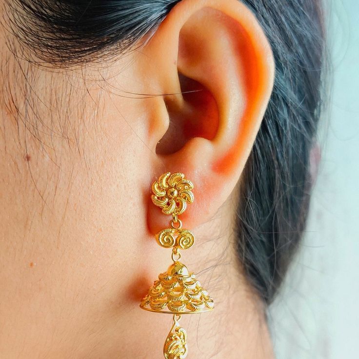 This is a beautiful 22k Real Gold pair of jhumka Earrings .  This is the perfect gift for mom, wife, fiancée, girlfriend, valentine, daughter, family or friend. It is a special gift for mother's day, valentine's day, wedding, anniversary, birthday, Christmas, Easter, New Year's and any holiday. 1. Material Details ✫ Gold : 22K (Real Gold) ✫ Gold Color Options: Yellow Gold ✰ Shape: floral ✰ Color: Yellow ✰ Weight: 9.301 grams approx. Terms & Conditions If there is any change. We request buyer to please inform us before item is shipped. After shipping we cannot accept any changes. Luxury Yellow Gold Jhumkas For Festivals, Luxury Yellow Gold Jhumkas As Gift, Indian Gold Earrings, 22k Gold Earrings, Gold Jhumka, Gold Jhumka Earrings, Earrings Indian, Jhumka Earrings, Floral Color