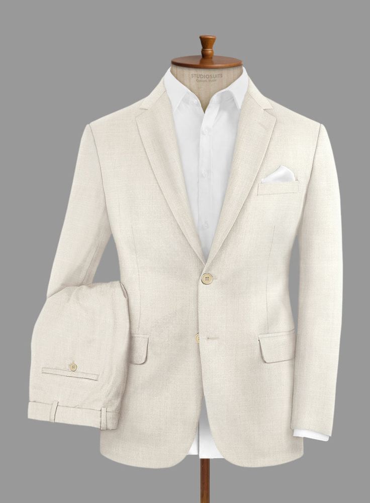 Indulge in the exquisite craftsmanship of this outstanding Loro Piana Bianchi Wool Silk Linen suit, designed for a man of discerning taste. Meticulously woven from premium wool, silk, and linen, it offers a luxuriously smooth texture with a subtle sheen, ensuring both comfort and elegance. This impeccably tailored suit, featuring a solid pattern and a beige hue, provides versatility and a refined look suitable for various occasions. It effortlessly transitions from professional settings to formal events with seamless elegance.    A marriage of elegance and comfort, Loro Piana fabrics are made using the highest quality raw materials in the world, in their purest form or blended together. A sophisticated response to the dictates of contemporary elegance, these fabrics lend themselves to a wi Beige Wool Suit For Semi-formal Occasions, Beige Wool Suits For Semi-formal Occasions, Tailored Luxury Linen Blazer, Semi-formal Beige Wool Suit, Luxury Single Breasted Linen Blazer, Luxury Tailored Linen Blazer, Luxury Linen Single Breasted Blazer, Luxury Single-button Sets With Notch Lapel, Elegant Formal Silk Unstitched Suit