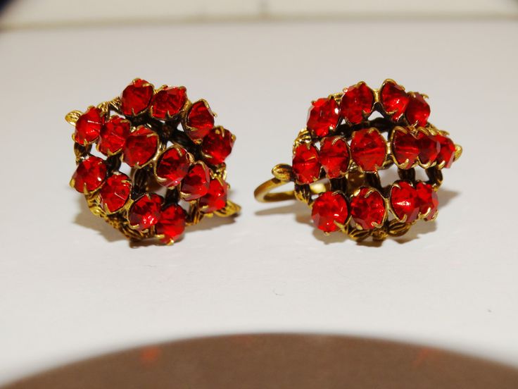 "Circa 1920's Gold Tone Czechoslov designer Red Earrings. 0.95\" x 0.70\" size." Vintage Red Jewelry For Evening, Red Vintage Earrings For Valentine's Day, Red Victorian Jewelry For Evening, Red Clip-on Earrings For Formal Occasions, Red Clip-on Jewelry For Wedding, Red Clip-on Earrings For Anniversary, Red Formal Costume Jewelry Earrings, Red Costume Jewelry Earrings For Formal Occasions, Vintage Red Earrings For Party