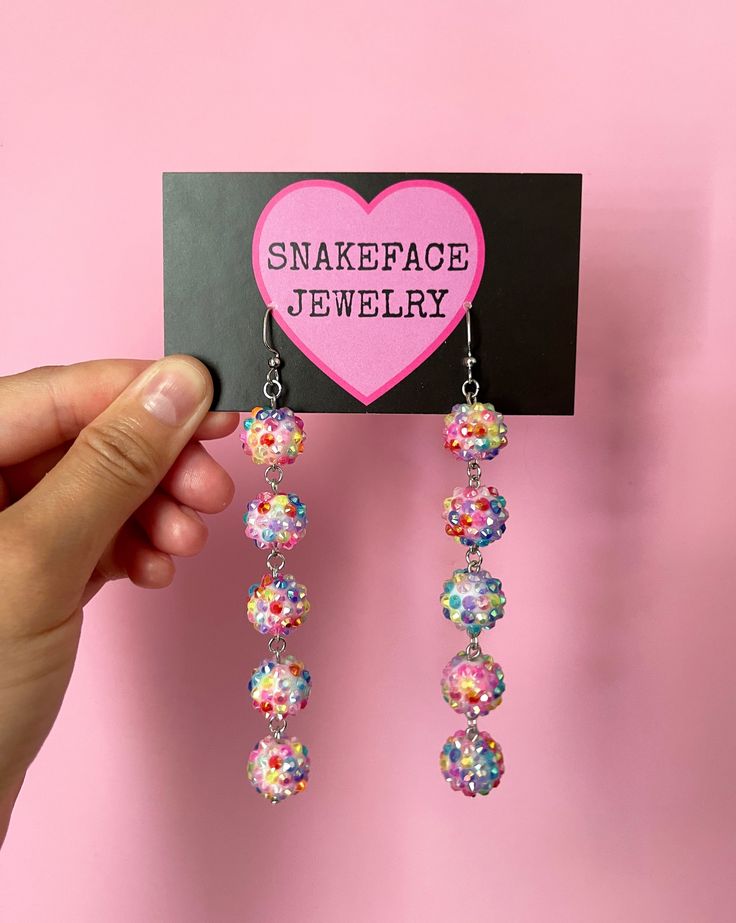 This is one of four doll-inspired jewelry collections! This is the fun, everyday doll collection! There are five styles to choose from: Large Fabric Stud Earrings - 2" in Diameter Sparkly Clay Mod Hoops - 2.25" Long, 1.5" Wide Multicolored Rhinestone Bead Dangles - 4.25" Long, .5" Wide Small Clay Star Stud Earrings - .375" Long and Wide Multicolored Star Dangle Earrings - 4.125" Long, .75" Long All jewelry sold is completely NEW and UNWORN. Large studs are made with fabric-covered aluminum butto Resin Dangle Jewelry For Birthday, Multicolor Hypoallergenic Jewelry For Party, Multicolor Hypoallergenic Party Jewelry, Hypoallergenic Multicolor Earrings For Parties, Playful Blue Jewelry For Party, Fun Multicolor Jewelry For Crafting, Fun Polymer Clay Jewelry For Birthdays, Fun Resin Jewelry For Parties, Birthday Resin Dangle Jewelry