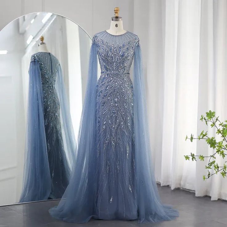 a dress on display in front of a mirror