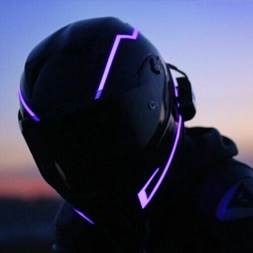 the helmeted man is wearing a purple light