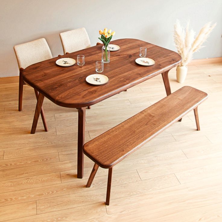 This stunning mid-century modern inspired Solid Wood Table boasts a timeless piece of furniture for your living area, featuring exquisite soft curved lines that add a touch of sophistication to any home. This handmade dining table offers a wide range of size options, making it ideal for use in the kitchen, dining area, or for general-purpose use. It stands out with its iconic wooden leg design, smooth surface, and rounded corners, offering users a spacious, secure, and aesthetic experience. Made Wood Oval Dining Table, Wood Rectangle Dining Table, Walnut Wood Dining Table, Dining Table Walnut, Dining Room Shelves, Mid Century Dining Table, Live Edge Coffee Table, Live Edge Dining Table, Walnut Dining Table