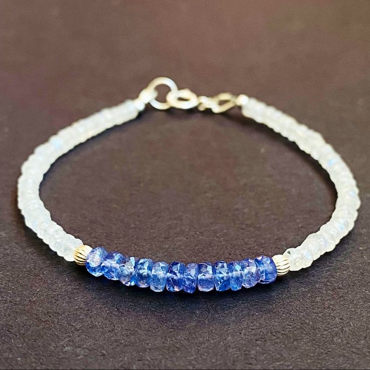 Simple Yet Beautiful Beaded Bracelet * Gemstone: ~ 4mm Natural Tanzanite Faceted Crystal Beads ~ 3.5mm Blue Flashy Rainbow Moonstone Faceted Crystal Beads. * Metal: Sterling Silver (Made To Order In Gold Filled ). * Size: 7�” Inches ( Custom Length Is Available). *** Tanzanite Is December Birthstone. *** Please Follow For More Beautiful Handmade Jewelry. Moonstone Bracelet Beads, Simple Beaded Bracelets, Black Spinel Bracelet, Tanzanite Bracelet, Beautiful Beaded Bracelet, Bracelet Simple, Birthstone Bracelet, Bracelet Crystal, Tanzanite Gemstone