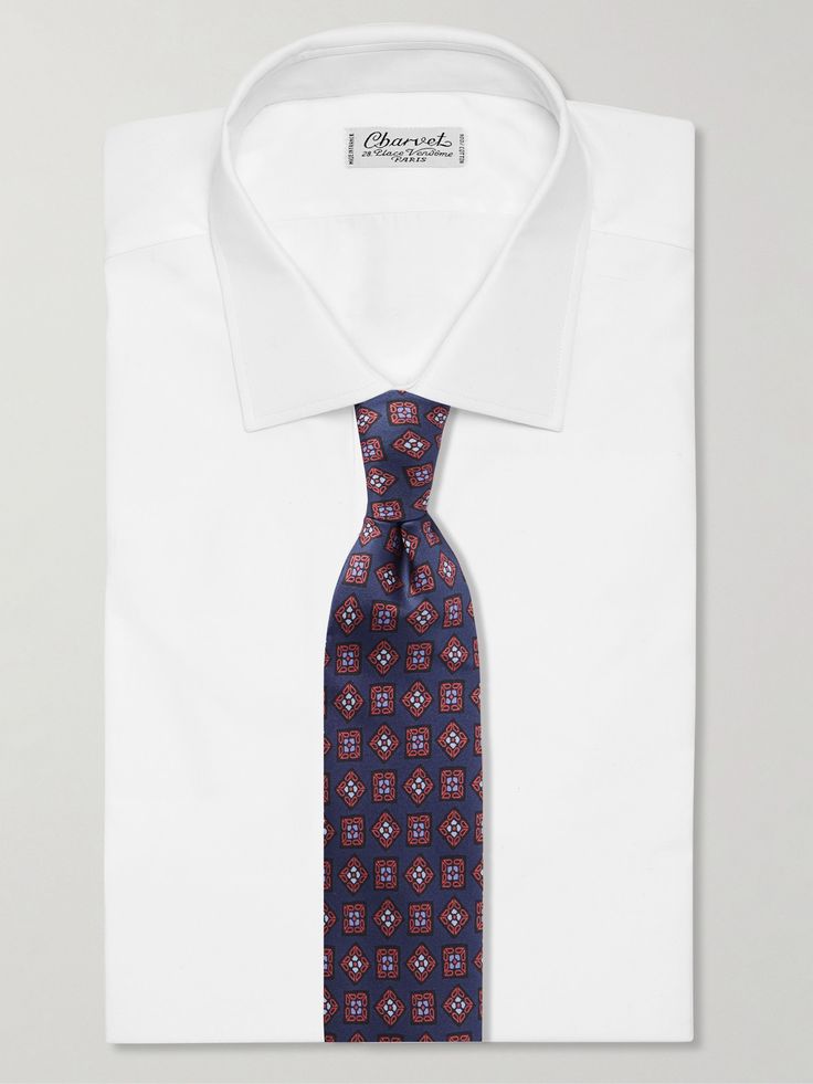 Charvet's commitment to impeccable craftsmanship extends to its accessories. This tie is made from lustrous silk-twill and printed with abstract squares that nod to vintage styles. Luxury Silk Ties, Luxury Silk Mark Certified Ties For Business, Elegant Silk Mark Certified Formal Ties, Luxury Silk Mark Certified Business Ties, Elegant Formal Silk Mark Certified Ties, Luxury Silk Ties For Semi-formal Occasions, Classic Multicolor Office Ties, Elegant Multicolor Silk Neckwear, Luxury Silk Neckwear For Formal Occasions