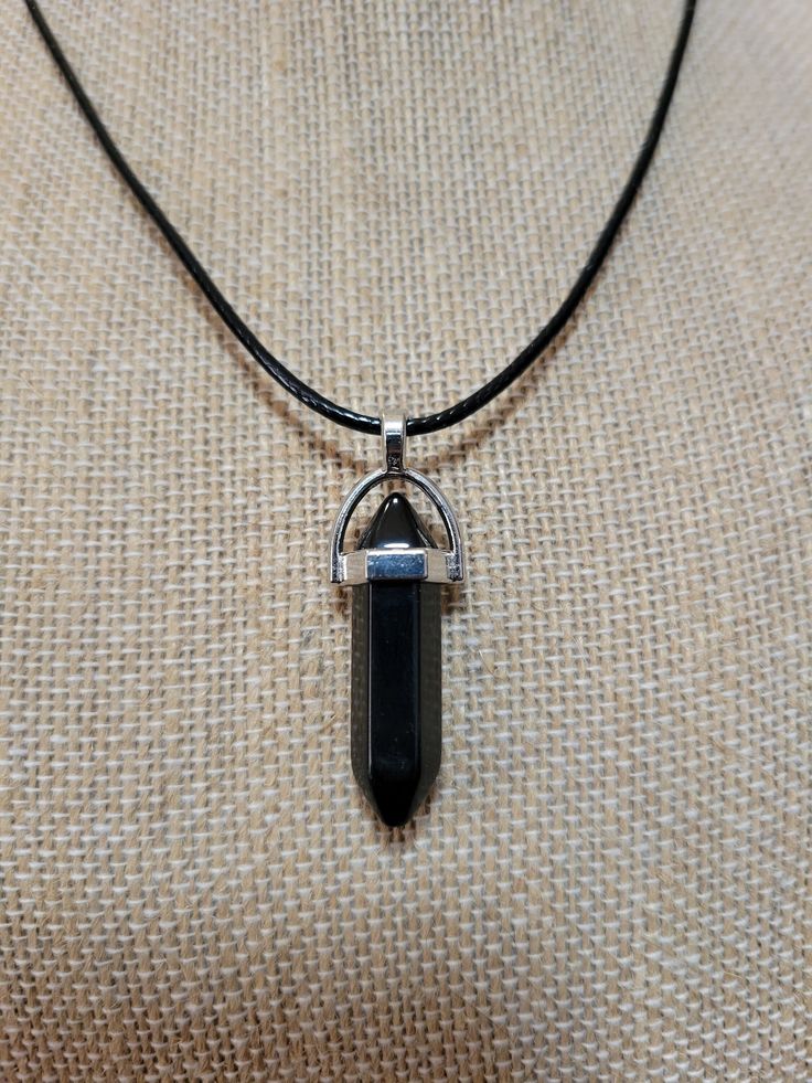 "Black Obsidian crystal pendant on a 20\" black cord adjustable necklace" Black Crystal Pendant, Obsidian Crystal Necklace, Adjustable Black Onyx Crystal Necklace, Casual Black Pendant Jewelry, Black Casual Necklace With Adjustable Cord, Casual Black Jewelry With Adjustable Cord, Casual Black Necklace With Adjustable Cord, Minimalist Black Pendant Crystal Necklace, Black Crystal Necklace With Adjustable Cord