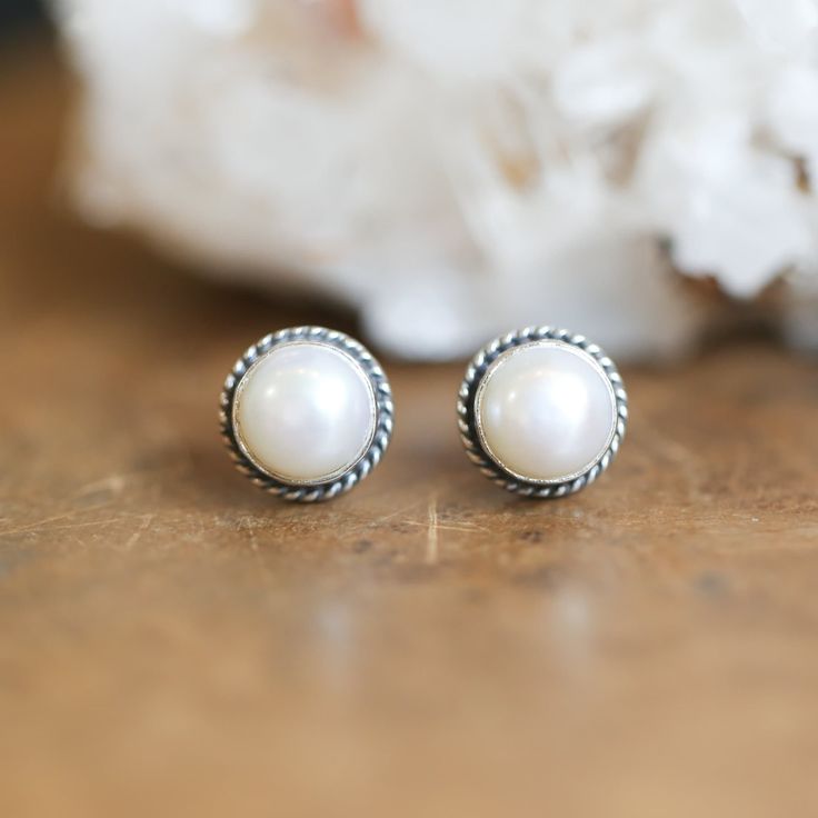 You are going to love these Freshwater Pearl Posts. These are beautifully crafted .925 Sterling Silver Earrings.These .925 Sterling Freshwater Pearl Posts earrings are just the perfect size and right amount of detail - a boho jewelry staple! .925 Sterling Silver twist wire embellish the Frestwater Pearls. These 8mm white mabe pearls are deeply lustrous and creamy white. AA Freshwater Mabe pearl - 8mm .925 Sterling Silver 10mm Total Width Pearls are always elegant -- and these add an element of m Classic Sterling Silver Jewelry For Pierced Ears, Classic Hypoallergenic Sterling Silver Earrings, Classic Sterling Silver Nickel-free Pearl Earrings, Classic Nickel-free Sterling Silver Pearl Earrings, Classic Sterling Silver Pearl Earrings Gift, Classic Hypoallergenic Sterling Silver Jewelry, Hypoallergenic Classic Sterling Silver Jewelry, White Sterling Silver Pearl Earrings Fine Jewelry, Classic Sterling Silver Pearl Earrings For Anniversary