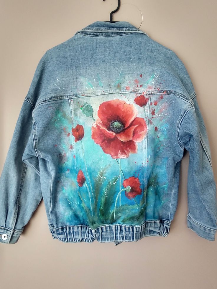 I have a very comfortable women's jacket painted for you. The poppies are painted with high-quality paint intended for fabrics. Back length - 60 cm The shoulder seam is dropped, so I give the sleeve length from the collar seam - 68 cm Width under armpit - 51 cm Size XS The jacket can be washed at 30 degrees by hand - I recommend or on a delicate fabric program, turned inside out, buttoned. We use delicate detergents, we do not use stain removers. All customs and tax fees when shipping abroad are Spring Denim Outerwear Hand Painted, Artistic Denim Outerwear For Spring, Hand Painted Blue Denim Jacket For Spring, Spring Hand Painted Denim Outerwear, Spring Hand Painted Denim Jacket, Spring Hand Painted Blue Denim Jacket, Hand Painted Trendy Denim Jacket For Spring, Hand Painted Blue Outerwear For Spring, Trendy Hand Painted Denim Jacket For Spring