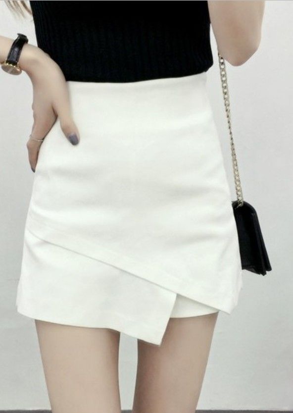 White Tight Mini Skirt With Wrap Front. This white tight skirt with wrap front is made of a soft stretchable fabric. This white tight bodycon skirt mini will make you you look very pretty and elegant. The features of this tight skirt are the following: white color, with wrap front, short size (mini length), tight bodycon fit. Elegant Mini Skirt Skort, Elegant Mini Skort In Solid Color, Elegant Solid Color Mini Skort, White High Waist Solid Color Skort, White High Waist Skort, White High-waist Skort, Chic Short Skirt In Solid Color, Trendy High Waist White Mini Skirt, Chic Solid Color Mini Skirt