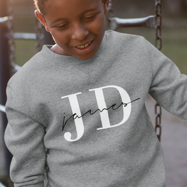 Boys Personalised Name & Initials Sweatshirt. Give a gift with a more personal touch and customised your own unique design. Please use size guide for exact measurements we returns are not accepted on customised products. Each set is made to order and dispatched from the United Kingdom. If you have any questions regarding the customisation, please get in touch and we'll answer any queries you may have. Personalized Long Sleeve T-shirt With Letter Print, Customizable Crew Neck Top For Personalized Gift, Custom Print Crew Neck Top For Personalized Gift, Personalized Cotton Sweatshirt With Name Print, Personalized Name Print Crew Neck Top, Cotton Sweatshirt With Name Print For Personalized Gift, Personalized Long Sleeve Casual Tops, Personalized Casual Long Sleeve Tops, Customizable Casual Tops For Personalized Gifts