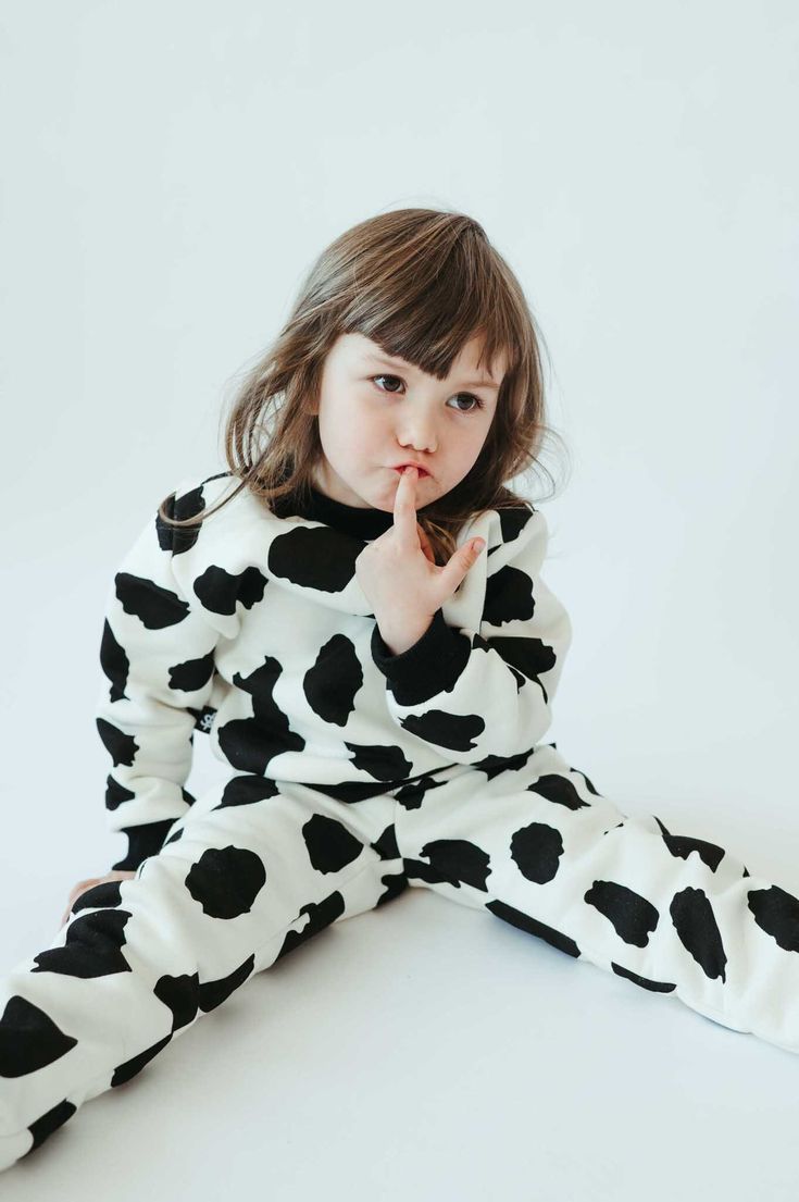 Sofa Killer trendy, playful, and creative unisex kids pullover / sweatshirt with COW print and black cuffs. Is your mini-me already the best dressed kid around? Well, make sure you add an extra layer of adorable with this super comfy SofaKiller round neck sweatshirt with long sleeves, All-over printed! Possible matching two-piece set with trousers or shorts. Oh, and we're not saying you should get all your family matching clothing...but we're totally suggesting it. After all, they are so soft it Playful Long Sleeve Sweatshirt With Ribbed Cuffs, Playful Sweatshirt With Ribbed Cuffs For Loungewear, Playful Sweatshirt With Ribbed Cuffs For Fall, Playful Fall Sweatshirt With Ribbed Cuffs, Playful Long Sleeve Sweatshirt For Loungewear, Playful Cartoon Print Sweatshirt For Playwear, Playful Sweatshirt With Cartoon Print For Playwear, Playful Long Sleeve Graphic Sweater, Playful Long Sleeve Sweatshirt For Playwear