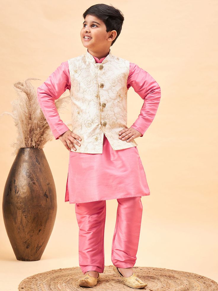 VASTRAMAY Boy's Beige Woven Nehru Jacket With Pink Kurta Pyjama Set Look dapper in this traditional set featuring a beige woven Nehru jacket, a pink kurta and pyjama. Crafted in a comfortable fabric, this set is perfect for any special occasion. Key Features Beige woven Nehru jacket Pink kurta Pyjama Specifications Sleeve Length- Long Sleeves Top shape- Regular Top pattern- Solid Top hemline- Straight Material & Care Jacket fabric: Silk Blend Top fabric: Silk Blend Bottom Fabric: Silk Blend Dry