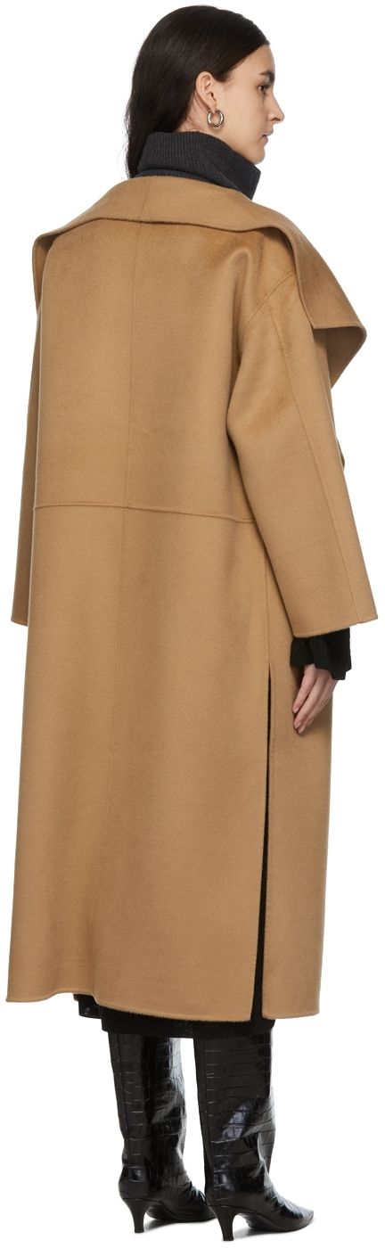 Long sleeve brushed wool and cashmere-blend coat in beige. Supplier color: Camel Luxury Beige Wool Coat With Concealed Placket, Beige Long Cashmere Wool Coat, Beige Long Wool Coat With Concealed Placket, Beige Pea Coat With Concealed Placket For Fall, Fall Beige Pea Coat With Concealed Placket, Beige Long Sleeve Cashmere Wool Coat, Beige Cashmere Wool Coat For Work, Oversized Beige Cashmere Outerwear, Modern Beige Wool Coat