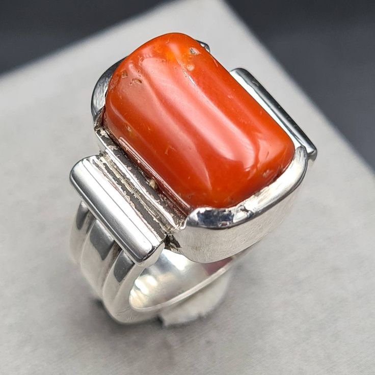 Modern Orange Gemstone Rings, Modern Red Ring Jewelry, Modern Red Gemstone Ring, Red Oval Rings With Natural Stones, Elegant Red Rings With Natural Stones, Modern Orange Rings As Gifts, Red Sterling Silver Rings With Natural Stones, Modern Orange Rings For Gifts, Modern Orange Rings For Gift