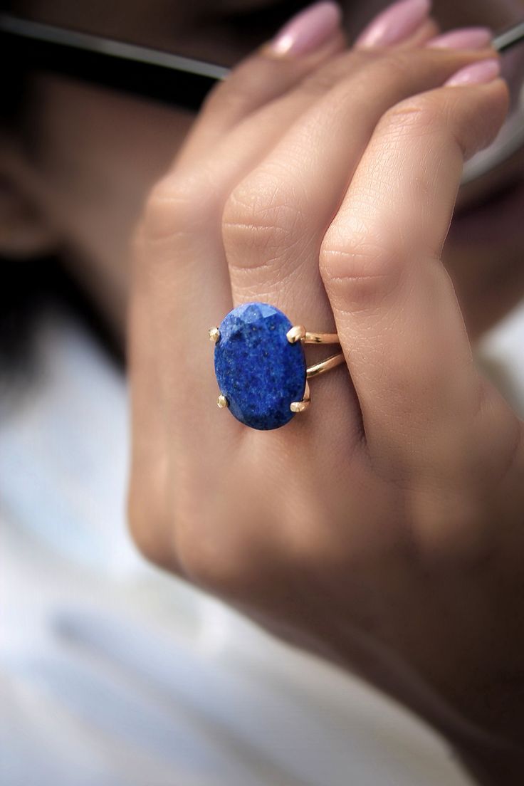 This stylish and stunning birthstone jewelry is a natural Lapis Lazuli in 14k gold-filled prongs and double band. A lovely September birthstone ring that can go with your look anytime. Wrap this Lapis Lazuli ring for a special loved one and capture her heart. ☛ 𝒜𝐵𝒞 - Add Engraving - https://etsy.me/2ZSRjhu ☛ Ring size - Select the size you would like from the drop down menu ♥ Gemstone Type - Lapis Lazuli ♥ Gemstone Size - 16x20mm ♥ Gemstone Cut - Faceted Oval ♥ Metal Type (Main Photo) - 14k G Yellow Gold 14k Rings With Natural Stones, Oval Rings With Prong Setting For Everyday, 14k Gold Oval Jewelry With Natural Stones, Everyday Oval Rings With Prong Setting, 14k Gold Ring With Large Stone, Oval 14k Gold Rings With Natural Stones, Oval Yellow Gold Rings With Natural Stones, 14k Gold Rings With Large Stone For Gift, 14k Gold Ring With Large Stone For Gift