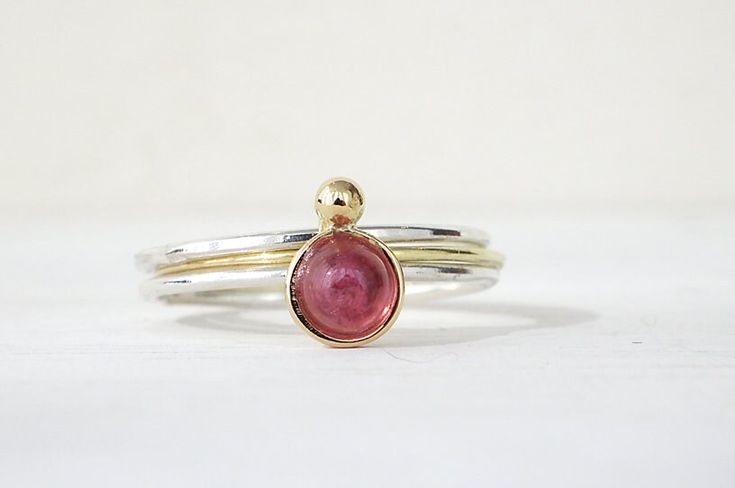 *Mahenge Spinel 4.0mm cabochon *Gold : 18k 0.4mm *Silver : 1.0mm *Ring ＃4 US size Resizing is available. Modern Ruby Ring With Bezel Setting, Formal Stackable Round Ruby Ring, Formal Stackable Ruby Ring, Polished Tourmaline Round Ring, Sterling Silver Yellow Gold Stackable Rings, Polished Tourmaline Rings, Dainty Round Stackable Rings Hallmarked, Dainty Hallmarked Stackable Rings, White Gold Ruby Ring With Bezel Setting