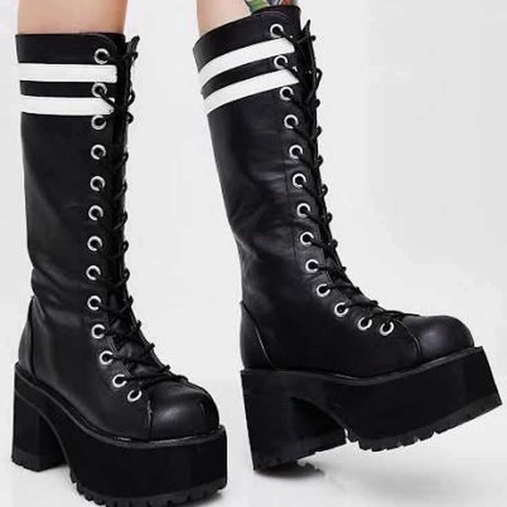 Demonia Ranger-320 Knee High Platform - Box Included Lace Up/Zip Up Black-White Vegan Leather Unisex - Us Women's 9m/Men's 7m Uk 6 Eu 39 22.1 Cm Laced Front Two White Stripes At Top Of Shaft 2 1/4" Platform 3 3/4 Inch Heel Back Metal Zip Closure. Little Razor Zipper Pullies Manufactured By Pleaser Usa Brand New With Box. Tiny Scuff On Toe Pictured. They Came Like That. Look Cool Af In These Beauties! Super Comfortable. Great For Seeing Over Heads At Concerts And Festivals. White High Heel Boots For Streetwear, White Lace-up Platform Boots For Streetwear, Edgy White Platform Boots With Round Toe, Edgy White Boots For Streetwear, White Sporty Platform Boots, White High Heel Boots With Laces, White Lace-up Boots For Streetwear, Edgy White Leather Platform Boots, White Leather Edgy Platform Boots