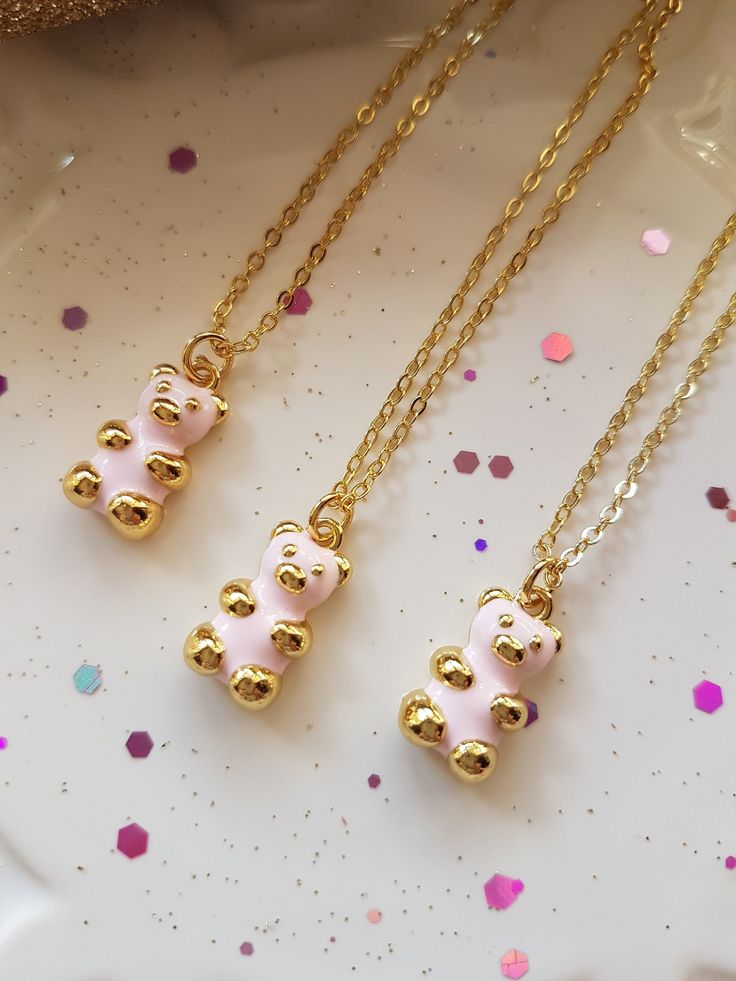 Just love this Adorable Teddy Bear necklace, such a cute little Teddy Bear. A lovely gift for the Girl of any age, it truly is a sweet Teddy Bear which is 18K Gold plated ( 18K Gold plated over Brass ) and Baby Pink coloured enamel to the front of the bear only. This Adorable Teddy Bear necklace is delightful and would make a wonderful present, Birthday Gift or a lovely Christmas present. The cable chain is a 18K Gold plated over copper and is 18 inch in length. The Teddy Bear charm is approx 17 Playful Gold Jewelry With Adjustable Chain, Kawaii Gold Nickel-free Jewelry, Kawaii Nickel-free Gold Jewelry, Handmade Kawaii Gold Jewelry, Handmade Gold Kawaii Jewelry, Gold Nickel-free Kawaii Jewelry, Cute Adjustable Necklaces For Best Friend Gift, Whimsical Personalized Necklace For Birthday Gift, Hypoallergenic Pink Jewelry For Birthday