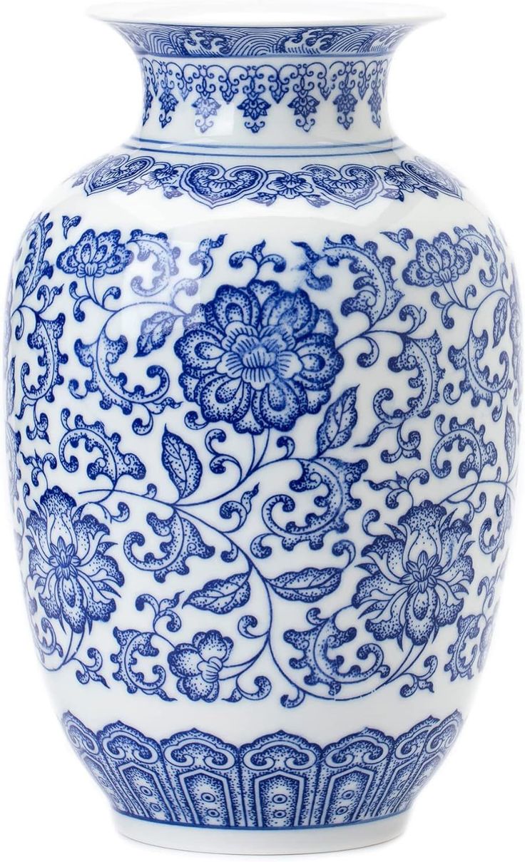 a blue and white vase is shown on a white background with an ornate design in the middle