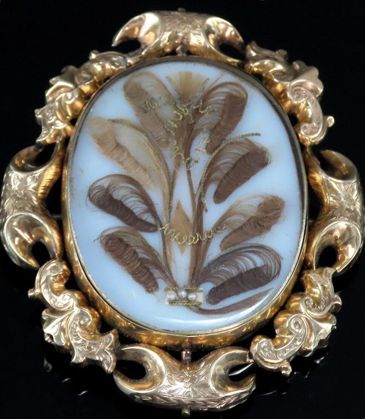 Presented is a neat antique Victorian low karat gold memorial pin or brooch. This is an American piece, dating to circa 1845-1865. The pin is oval in form, with finely done hair work decoration on one side, along with tiny seed pearls and gold wire. The other side has an old photograph of two girls in prominent hats. The oval center portion with the hair/photograph rotates in place when the pin back is opened, so it can be worn with either side displayed. The gold frame is ornate and nicely hand Victorian Gold, Seed Pearl, Two Girls, Gold Wire, Hand Engraving, Antique Victorian, Pin Brooch, Vintage Watches, Gold Frame