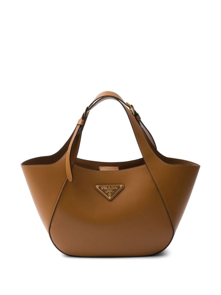 caramel brown leather smoothing finish enamel triangle logo two adjustable top handles magnetic fastening internal zip-fastening pocket internal logo stamp leather lining gold-tone hardware rectangle body Prada Leather Tote, Prada Tote Bag, Cowhide Handbags, Beige Bag, Prada Leather, Orange Bag, Triangle Logo, Brown Bags, Small Purse