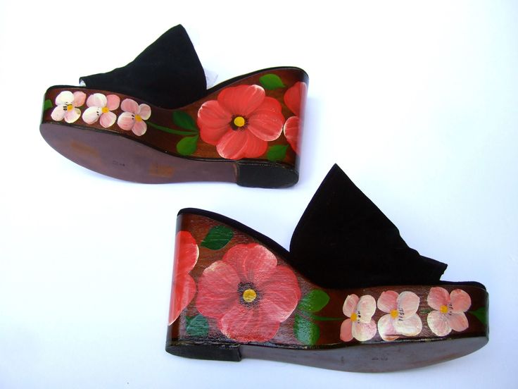 NEIMAN MARCUS Italian hand painted wood platform sandals c 1970s  Vintage Size 37.5 Refer to enclosed measurements to determine current size The stylish vintage wood platform sandals are embellished with hand painted flowers  Designed with a wide band of black suede that the foot slides into  Makes a stylish summer wear or resort wear accessory  On Sale Reduced from $235 dollars  Stamped size 37.5 As a vintage shoe the size scale has changed  over the decades. Refer to enclosed measurements  The Spring Vintage High Heel Clogs, Vintage Open Toe Summer Clogs, Vintage Summer Clogs With Wooden Heel, Vintage Open Toe Clogs With Wooden Heel, Vintage Platform Clogs For Spring, Vintage Spring Platform Clogs, Vintage Clogs With Wooden Heel For Spring, Wood Platform Sandals, Vintage Shoe