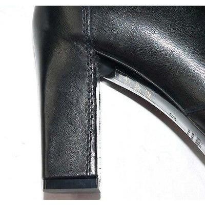 Fabulous! Extremely high-end designer leather boots from MaxMara of Italy! Brand New! Size-35 This is a gorgeous pair of glove leather boots that are black and have side zippers. Includes the dustbag and extra heel caps! Leather-lined and leather soles too. Rich black with 31/2" heel! Just stunning! Will be with you for years and years! Boot measures 9 3/4" from the floor. Top of shaft measures approx. 10" around. You know the quality of designer Max Mara of Italy. Pictures speak for themselves. Elegant Round Toe Chelsea Boots For Party, Elegant Ankle-high Black Chelsea Boots, Elegant Chelsea Boots With Square Toe And Leather Sole, Elegant Leather Chelsea Boots With Square Toe, Elegant Chelsea Boots With Leather Sole And Square Toe, Elegant Chelsea Boots With Stacked Heel And Square Toe, Elegant Ankle-high Chelsea Boots With Stacked Heel, Elegant Chelsea Boots With Square Toe In Calf Leather, Elegant Almond Toe Chelsea Boots For Office