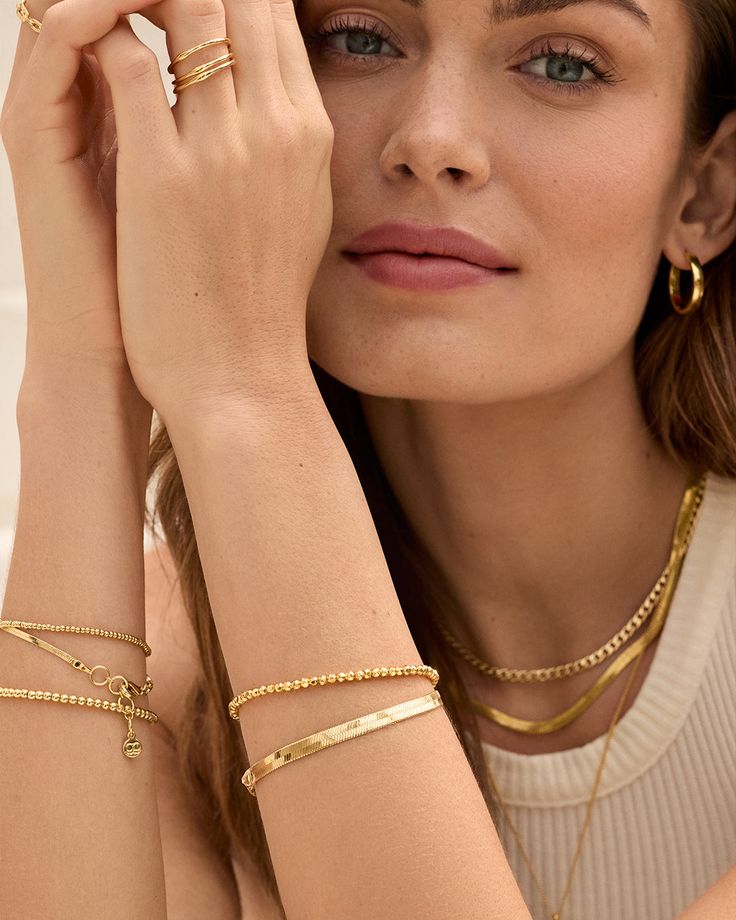 Elevate your everyday stack with the eye-catching Venice Bracelet. A classic herringbone chain designed to move with you. Wear it to the office, a special occasion or every day. This herringbone bracelet is sure to become a staple in your jewelry collection. Venice Bracelet in 18k Gold, Women's by gorjana Gold Minimalist Jewelry Aesthetic, Lifestyle Photography Jewelry, Old Money Bracelet Stack, Staple Gold Jewelry, Everyday Jewelry Stack, No Tarnish Jewelry, Office Jewellery For Women, Everyday Bracelet Stack, Gold Summer Jewelry