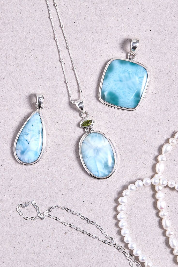 Larimar is the ultimate summer jewellery! The Larimar stone paired with Peridot make that lovely pendant that will be the perfect piece to wear all summer. The stones are set on a 925 sterling silver double bezel. Dimensions: Total height: 42mm Total width: 20mm Top stone height: 3mm Top stone width: 6mm Bottom stone height: 23mm Bottom stone width: 16mm Bezel + stone thickness: 4mm Bail size: 4mm - Please note - * More photos or videos available on request. * Go to 'About us' section to find links to our social and website * Only the pendant and without the chain is included in the price * Gemstones are natural material, they can slightly differ in color, size, shape and may show some inclusions or cracks inside the stone itself. We do take great care in picking the best quality stones fo Aquamarine Gemstone Jewelry For Jewelry Making, Aquamarine Jewelry Gift, Aquamarine Stone Jewelry Gift, Fine White Aquamarine Jewelry, Larimar Gemstone Jewelry For Anniversary, Aquamarine Stones For Jewelry Making, White Aquamarine Fine Jewelry, Fine Jewelry White Aquamarine, Larimar Gemstone Necklace For Anniversary