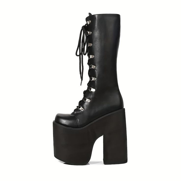 Elevate your style with our Black Gothic Punk Lace Up Mid Calf Chunky Platform Boots. Crafted from luxurious vegan leather, these boots feature chunky platform soles and block heels, providing both comfort and added height. The adjustable lace-up front and mid-calf length create a unique, edgy look, perfect for gothic, punk, rock, or alternative fashion enthusiasts. Step up your wardrobe with this bold statement piece. Luxurious vegan leather construction Chunky platform soles and block heels for comfort and height Adjustable lace-up front for a custom fit Mid-calf length for an edgy look Perfect for gothic, punk, rock, and alternative fashion Punk Platform Boots With Reinforced Heel For Streetwear, Faux Leather High Ankle Platform Boots For Streetwear, High Ankle Faux Leather Platform Boots For Streetwear, Streetwear High Ankle Platform Boots In Faux Leather, Alternative Leather Platform Boots For Concert, Trendy Platform Heeled Boots For Streetwear, Leather Lace-up Boots With Chunky Platform And Block Heel, Trendy High Cut Chunky Platform Boots, Punk Leather Platform Boots For Concert