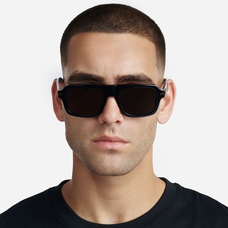 Embrace sophistication with the Dude Sunglasses. Handcrafted from pure black acetate, they radiate timeless elegance. The dark lenses add an air of mystery. We know you will appreciate the iconic GC Logo engraved signature, reflecting your discerning taste. MATERIAL Pure black acetate frame with black metal detailing UV 100% UVA/UVB Protection WEIGHT 41 g SIZE 52 □ 20 - 145 INCLUDED IN THE BOX Lens cleaning cloth, soft leather case Matte Black Sunglasses With Uv Protection For Formal Occasions, Classic Matte Black Shield Sunglasses With Uva Protection, Sleek Black Polarized Sunglasses, Matte Black Classic Sunglasses For Formal Occasions, Classic Matte Black Sunglasses For Formal Occasions, Matte Black Square Frame Formal Sunglasses, Classic Matte Black Formal Sunglasses, Sleek Wayfarer Sunglasses For Formal Occasions, Sleek Black Wayfarer Sunglasses