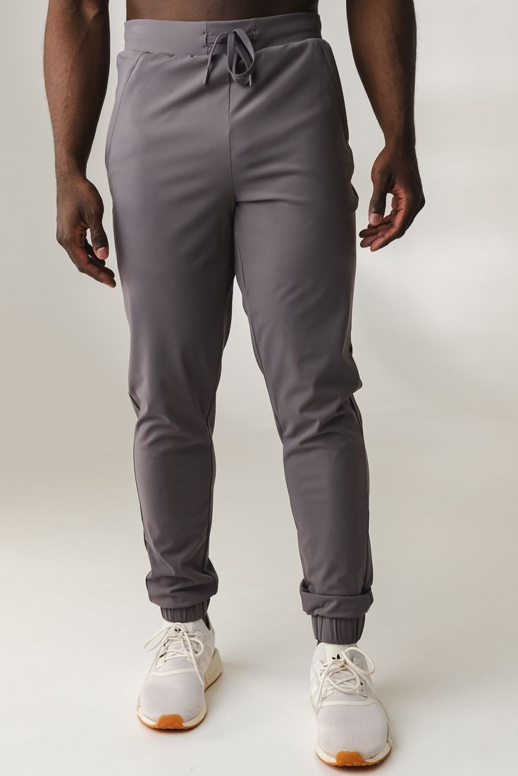 Our Navigator Jogger is designed to perform outdoors and on the go. This versatile jogger is a relaxed fit which offers functionality and comfort while also providing a sporty look to add to your wardrobe. Recycled Polyester Sportswear Bottoms For Outdoor, Gray Activewear With Pockets For Sports, Gray Sporty Pants With Comfort Waistband, Sporty Gray Pants With Comfort Waistband, Casual Recycled Polyester Activewear In Relaxed Fit, Sporty Athletic Fit Bottoms For Outdoor Activities, Athleisure Activewear For Outdoor Activities, Gray Sportswear Activewear For Outdoor, Nylon Activewear For Jogging