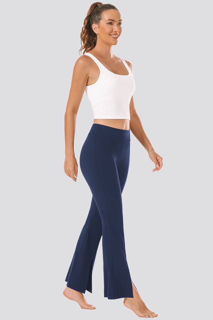 Premium Comfort: Experience unmatched softness with our Women's Bootcut Yoga Pants, crafted from 75% nylon and 25% spandex for a sweat-wicking, non see-through, and skin-friendly feel. Elegant Design: Look stylish with a high waist for tummy control, a wide leg for free movement, and a split hem that adds a touch of elegance to your yoga attire. Versatile Style Options: Pair these flared yoga pants with a sports bra and sneakers for a sporty look, or a cropped top and platform shoes for a fashio Yoga Attire, Wide Leg Yoga Pants, Leg Yoga, Flare Yoga Pants, Yoga Pants With Pockets, Free Movement, Leg Design, Sporty Look, Split Hem