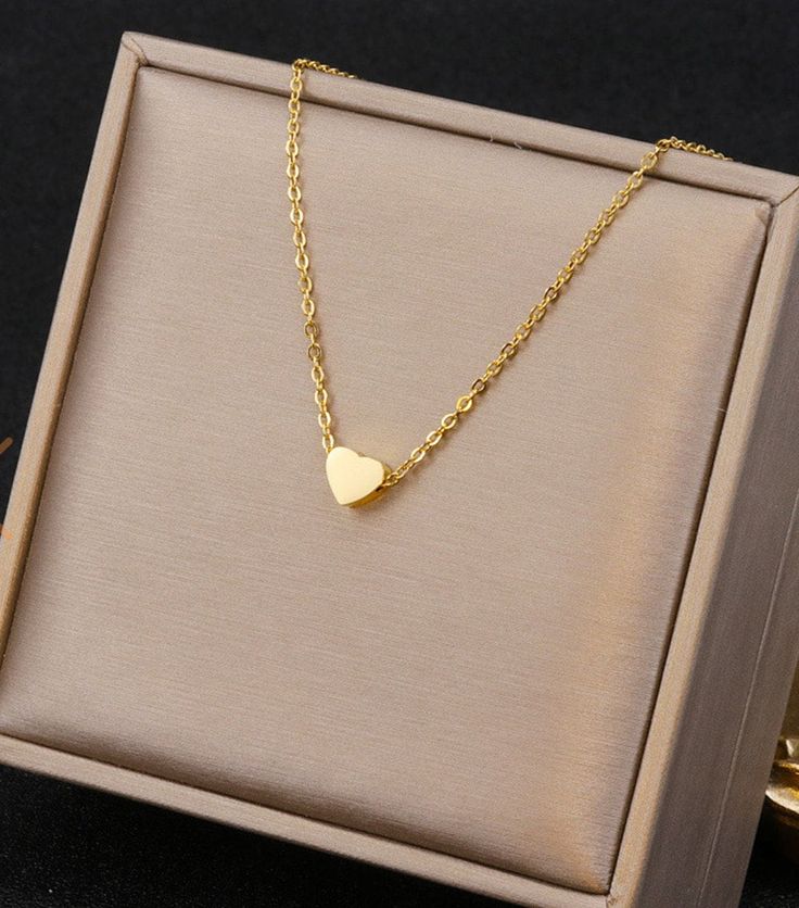 "Heart pendant necklace 18K gold plated stainless steel 17\" long total, 2\" expansion" Gold Stainless Steel Necklace For Anniversary, Gold Stainless Steel Jewelry For Mother's Day, Heart Pendant Stainless Steel Necklace As Gift, Dainty Gold-tone Jewelry For Valentine's Day, Tarnish Resistant Gold Heart Necklace, Heart Pendant Necklace With Delicate Chain In Stainless Steel, Stainless Steel Heart Charm Necklace For Her, Dainty Stainless Steel Jewelry For Valentine's Day, Gold Stainless Steel Heart Necklace For Anniversary